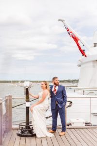 Bride and groom on pier at Hamptons Wedding | Brooke Michelle Photography