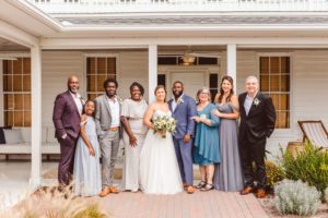 Bride and groom with family after ceremony | Brooke Michelle Photography