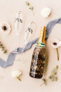 Hand-painted champagne bottle for wedding | Brooke Michelle Photography