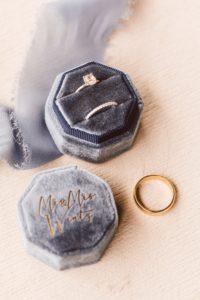 Wedding bands in blue velvet ring box | Brooke-Michelle-Photography