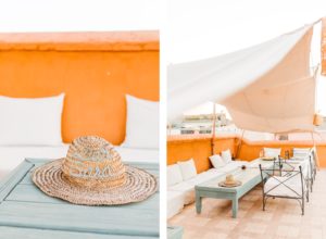 Hat that says Dar Sara sitting on rooftop table in Marrakesh, Morocco | Table and chairs under canopy on rooftop in Marrakesh, Morocco | Brooke Michelle Photography