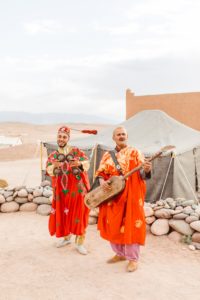 Traditional Moroccan musicians playing for group of women traveling together | Brooke Michelle Photography