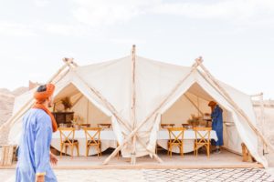 Tent set up in the Afgay Desert for dinner after camel rides | Brooke Michelle Photography