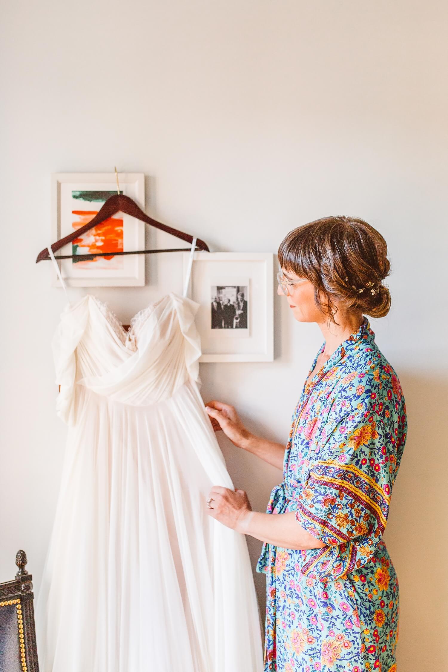 Bride admiring wedding dress before getting ready for wedding at The LINE DC | Brooke Michelle Photography