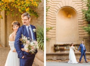 Bride standing behind groom while he looks over his shoulder at her | bride and groom holding hands and walking in front of fountain | Brooke Michelle Photography