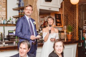 Couple giving speech at beginning of wedding reception | Brooke Michelle Photography