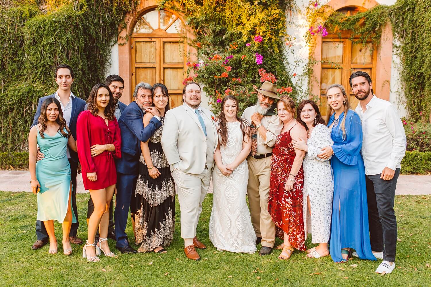 Bride and groom with family during Mexico destination wedding reception | Brooke Michelle Photo