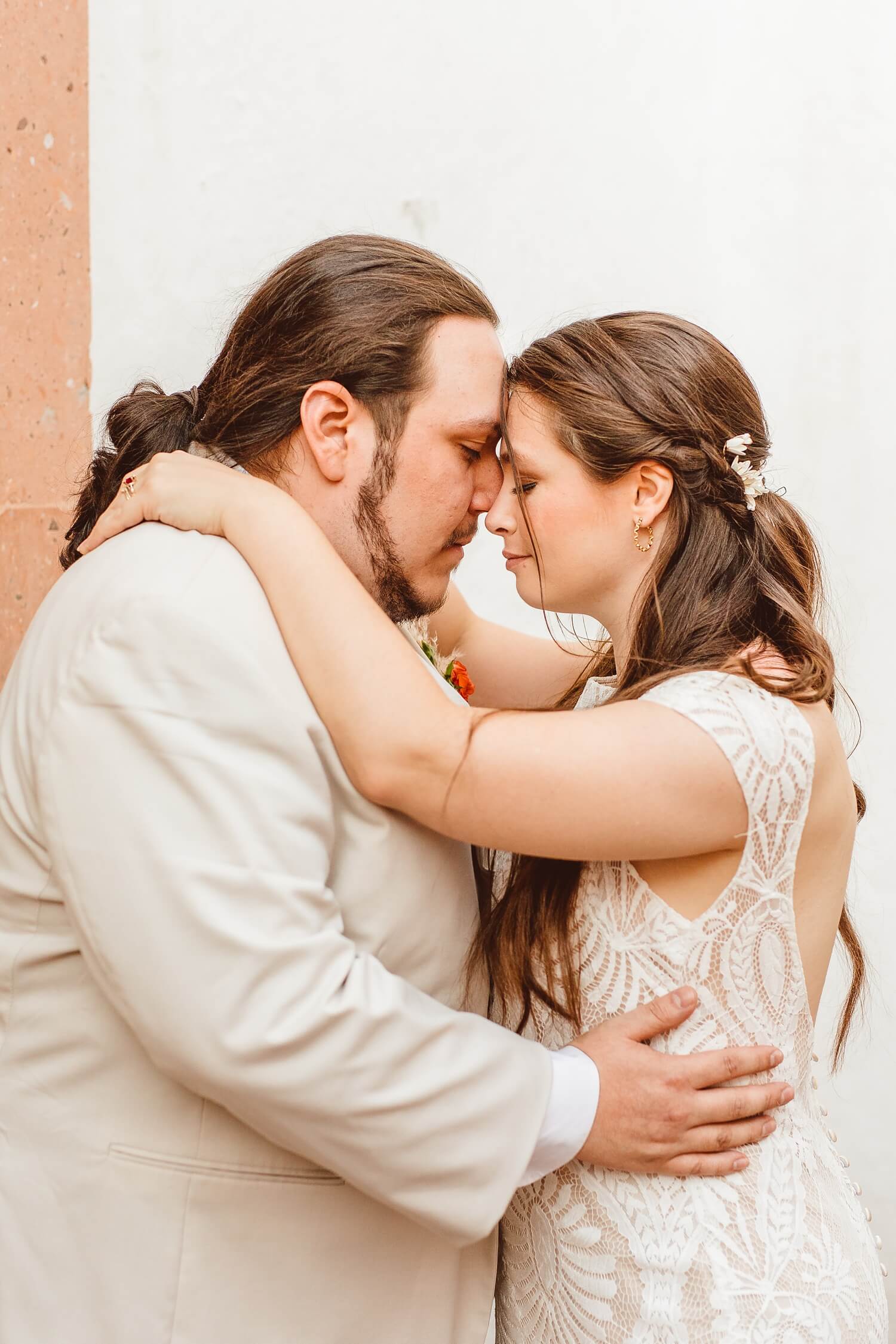 Bride and groom placing foreheads together at Mexico destination wedding | Brooke Michelle Photo