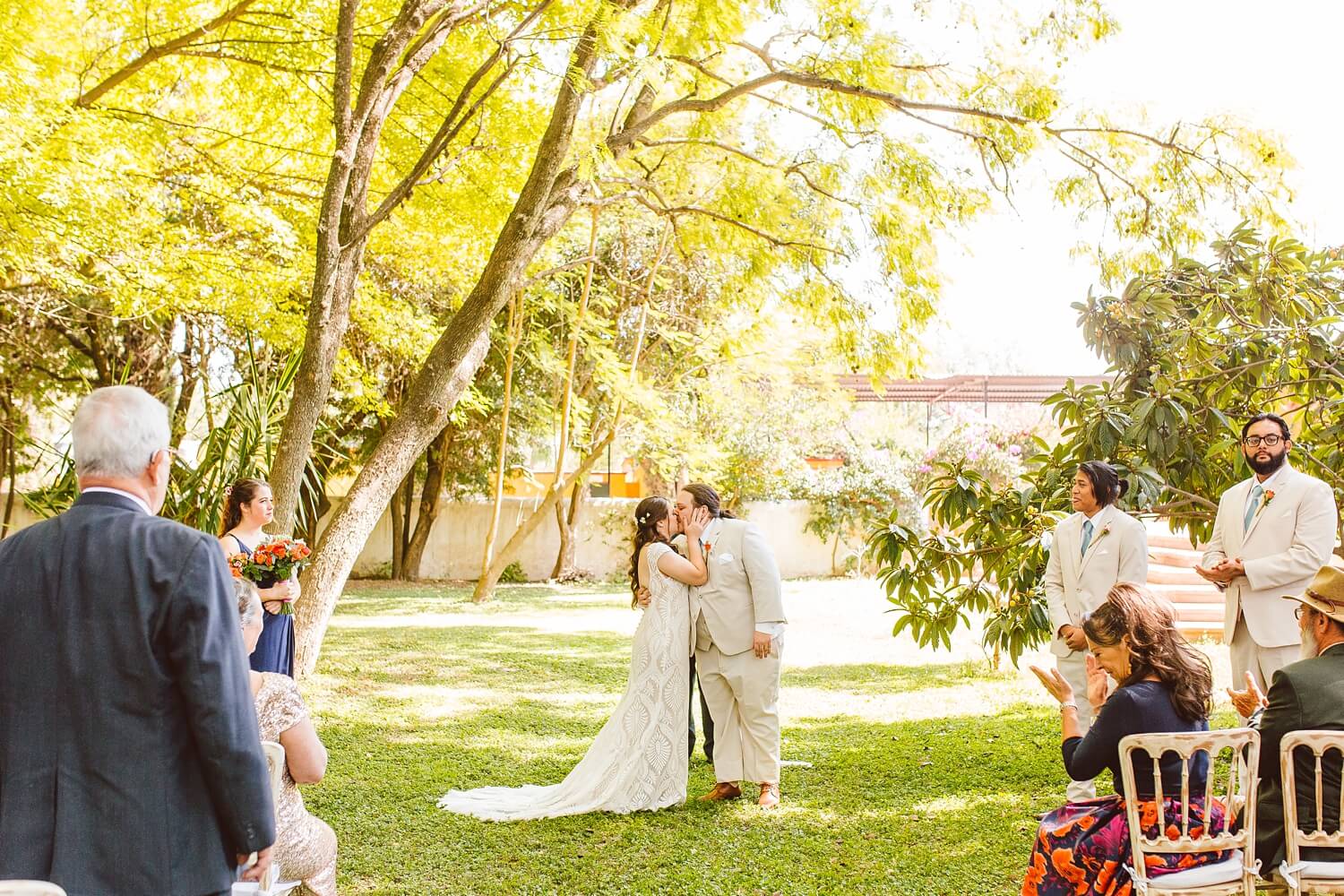 Bride and groom kissing after ceremony in Mexico | Brooke Michelle Photo