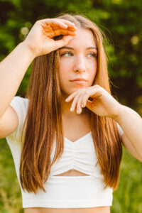 Senioir portraits photoshoot in grassy fields