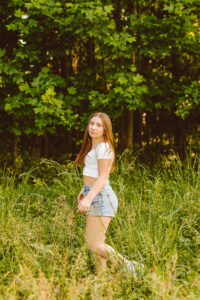 Senioir portraits photoshoot in grassy fields