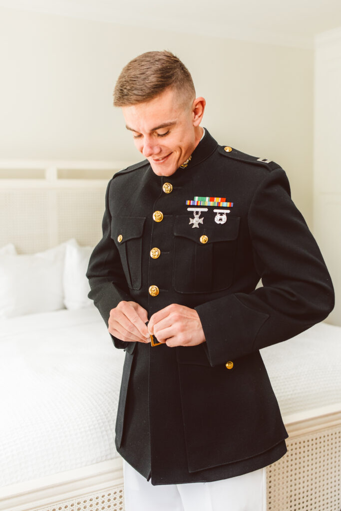 Marine groom getting ready for wedding