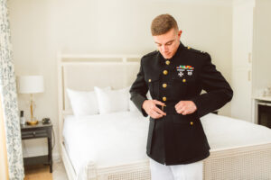 Marine groom getting ready for wedding