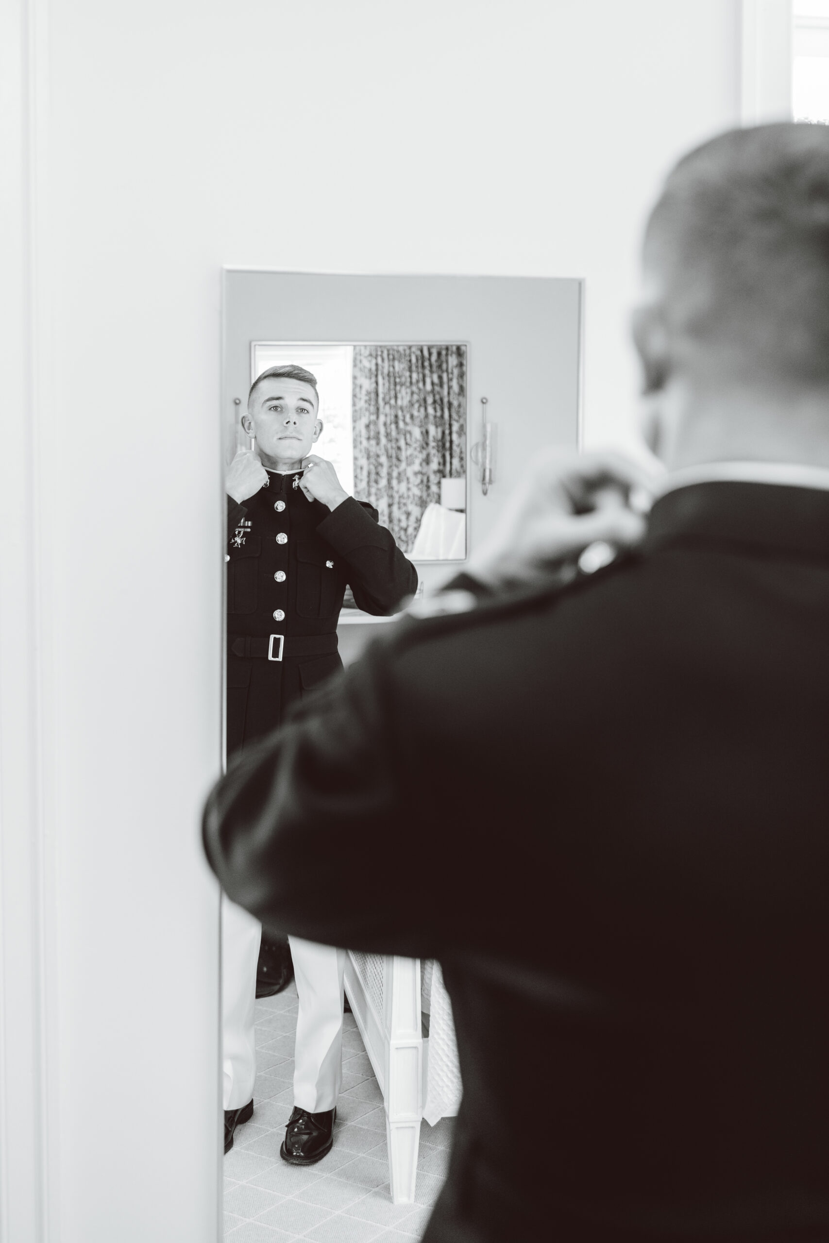 Marine groom getting ready for wedding