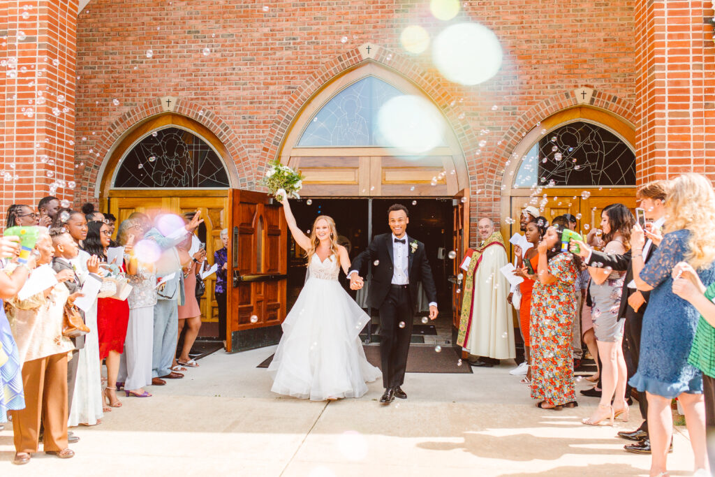 Bride and groom bubble exit
