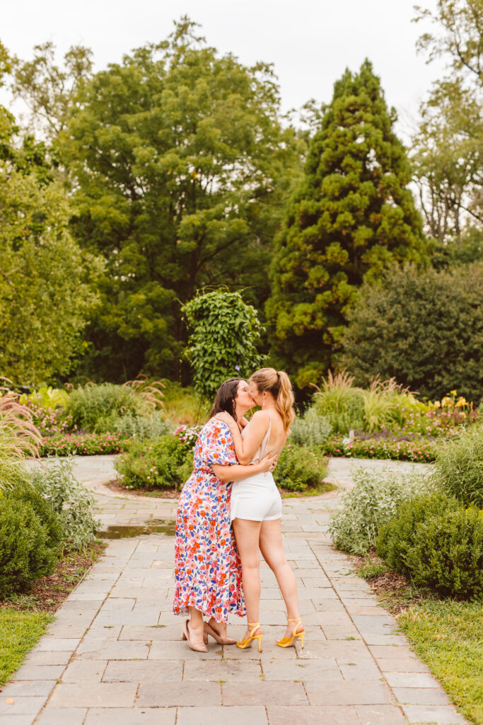 amazing couple hugging each other at a garden