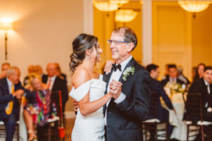 bride dancing with her father at her elegant wedding