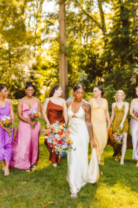 bride posing with her bridesmaids