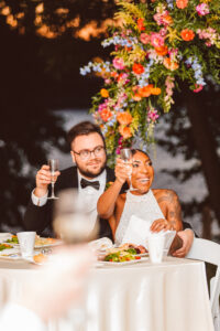 couple during a toast after their garden wedding