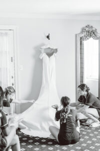 brides getting the brides dress ready