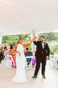 stunning couple dancing at their garden wedding reception