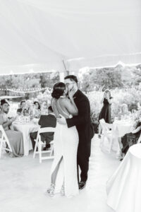 b&w photo of the bride and groom dancing