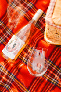 picnic engagement session wine