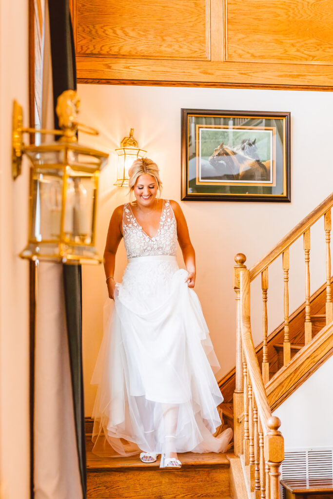 stunning bride walking down the stairs