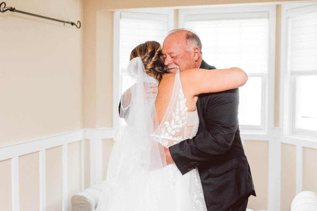 bride and her dad hugging