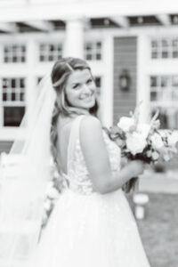 stunning bride smiling at the camera