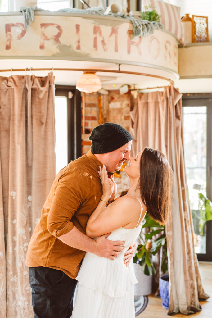 couple kissing during their Romantic & Vibrant Engagement Session