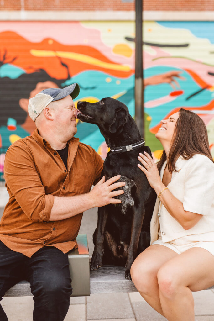portrait of the newly engaged couple and their dog