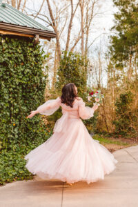 stunnign bride wearing a pink wedding dress