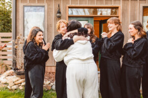 bride and her friends hugging