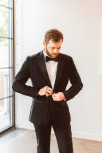 groom at his elegant wedding ceremony