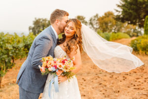 newlyweds at their Romantic Vineyard Wedding