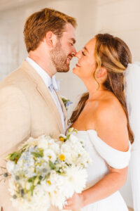 cute portraits of the newlyweds before their playful summer wedding reception