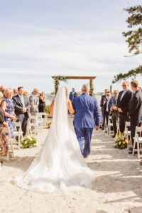 Stunning picture of the bride walking down the aisle