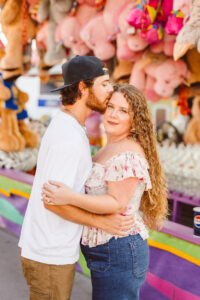 Fiancé, kissing his fiancé on the forehead