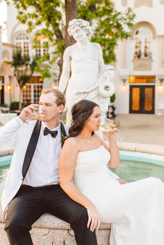 newlyweds celebrating their wedding with champagne