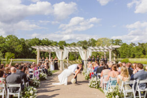 cute picture of the newlyweds heading to their wedding reception