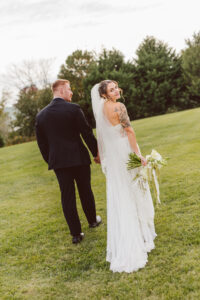 cute portrait of the newlyweds during golden hour