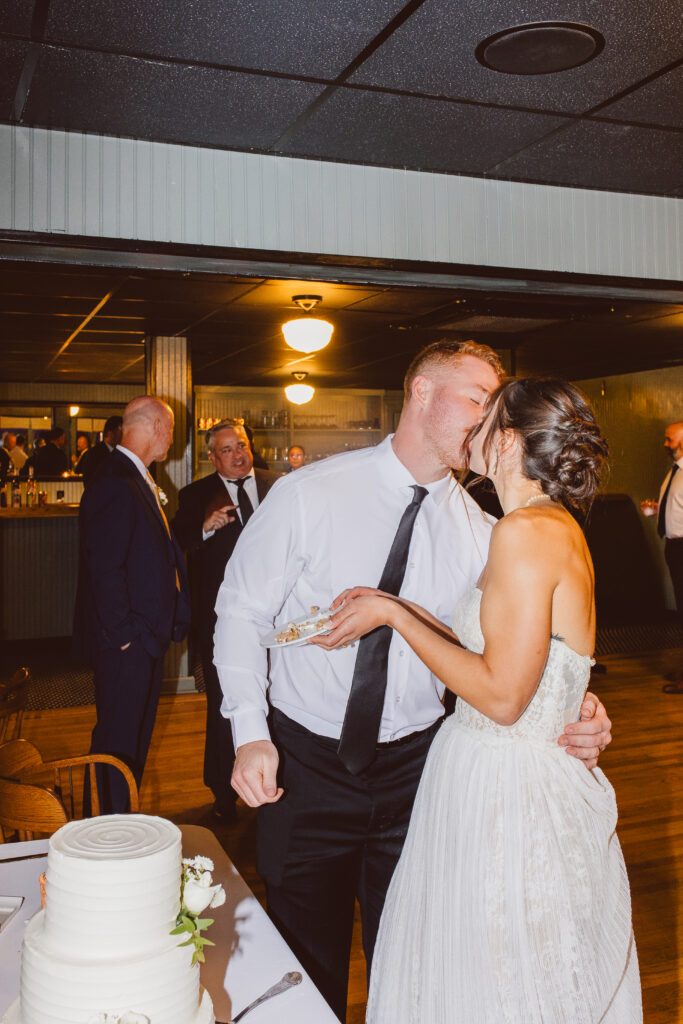 cute picture of the newlyweds kissing