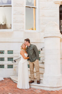 fiance kissing his fiance on the forehead