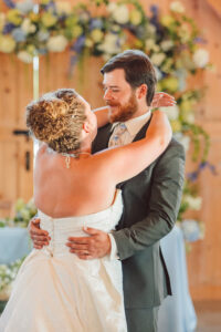 cute picture of the bride and groom smiling at each other