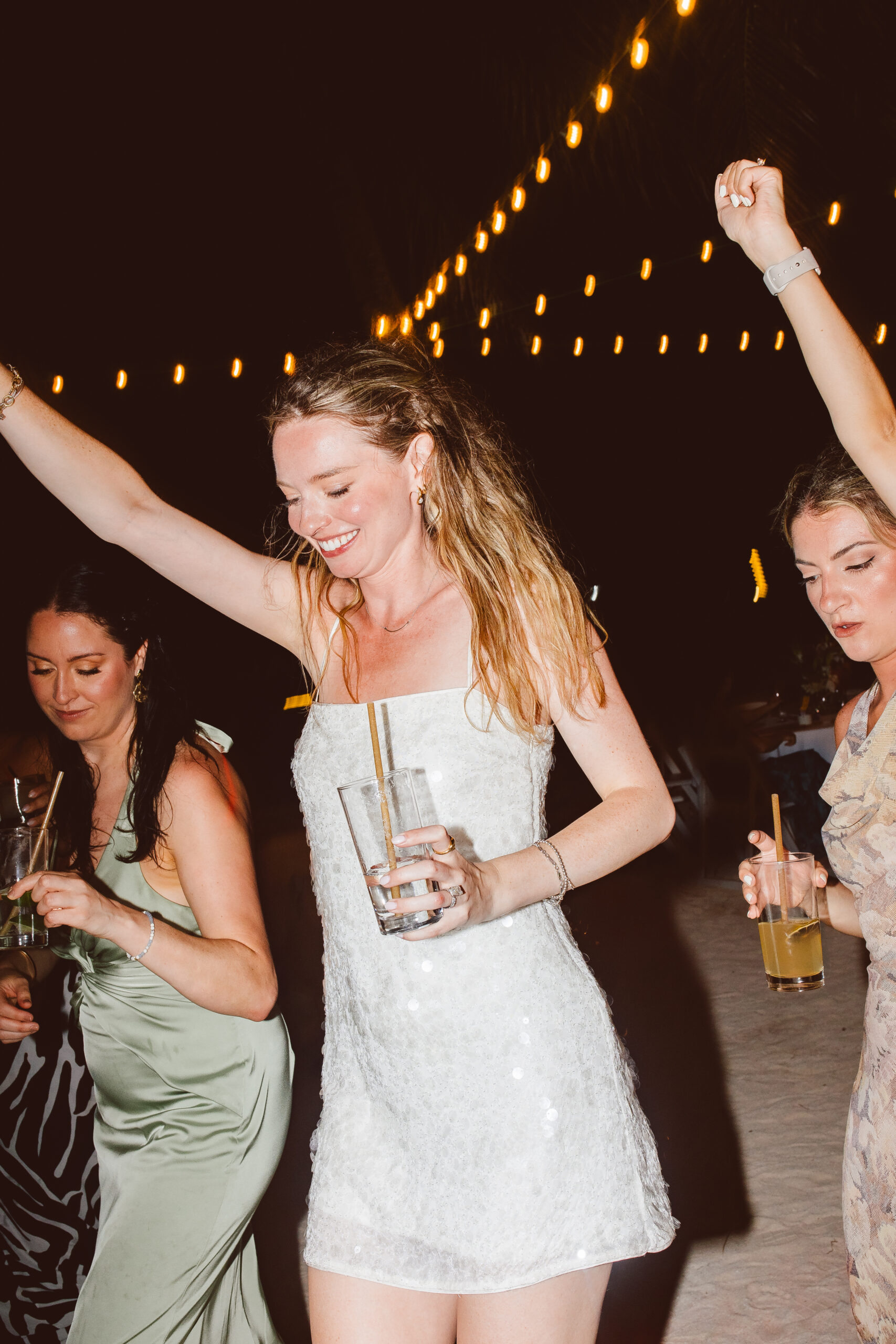 guests having the best time at the wedding reception party in belize