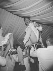 groom having the best time at his wedding reception party