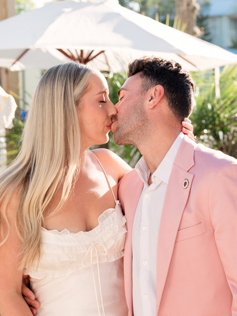 cute picture of the bride and groom kissing